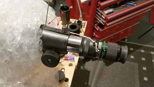 Many inexpensive telescopes have an eyepiece extension that can be adjusted to prevent tilting.