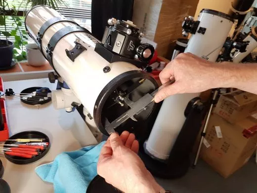 Check that the secondary mirror is in the center of the tube and thus in the center of the primary mirror.