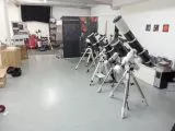 Partial view of our astronomy exhibition with various telescopes on display.